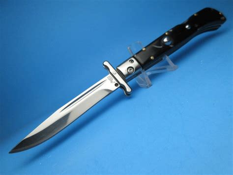 This time the OTF mechanism won't lock-up in the closed (retracted) position. . Akc roma switchblade knife